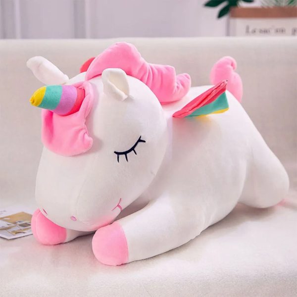 peluche licorne couchée blanche