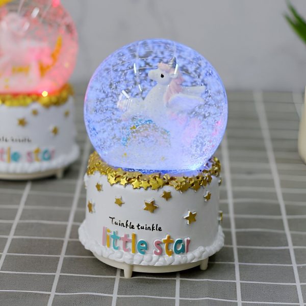 Boule à neige Licorne indigo lumineuse à paillettes